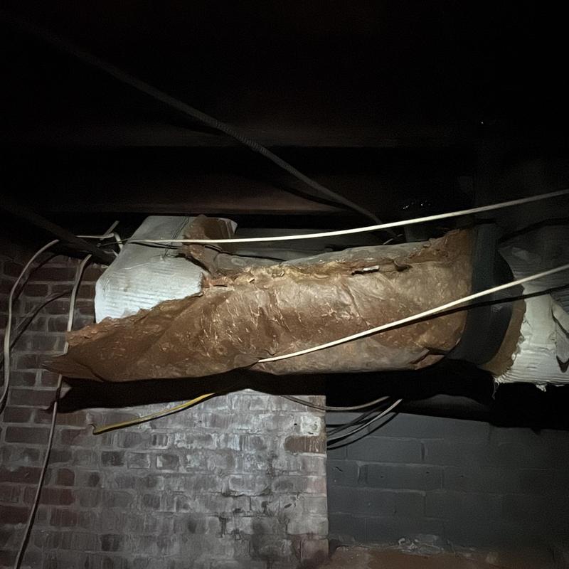 Duct insulation damage in basement HVAC system
