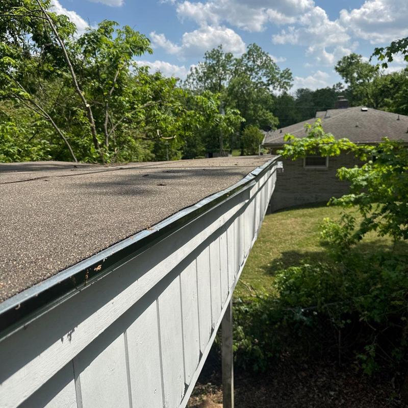 Roof edge and gutter inspection on flat roof