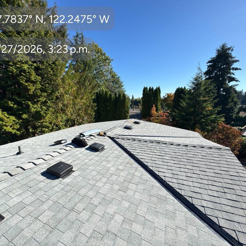 Shingle roof replacement with vents and ridge caps
