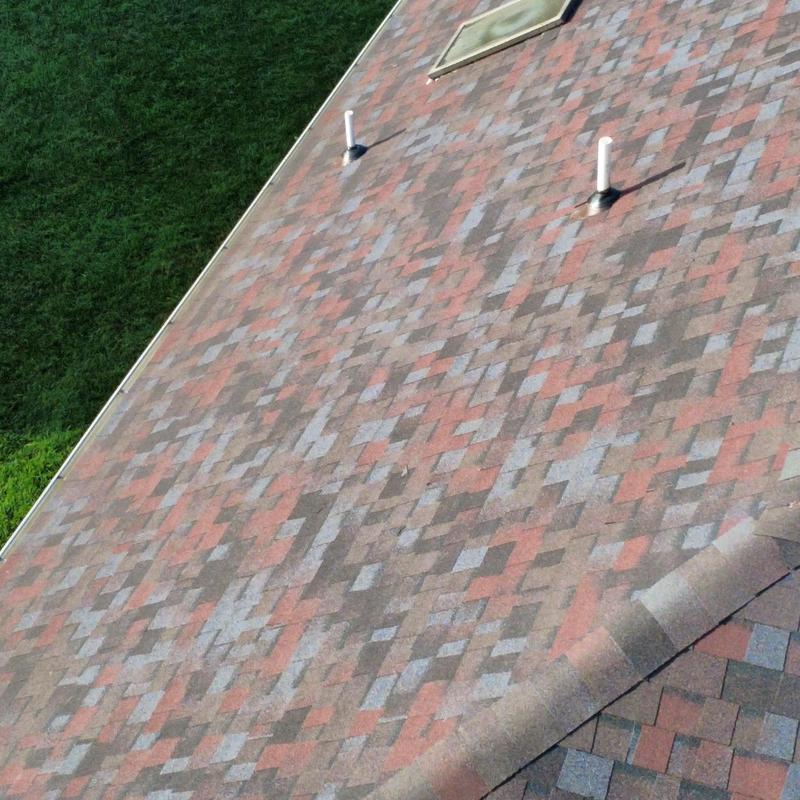 Owens Corning Merlot shingles on steep roof slope