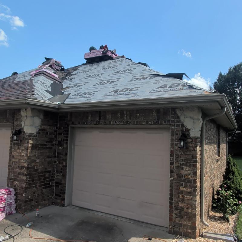 Roof underlayment installation with storm damage repair