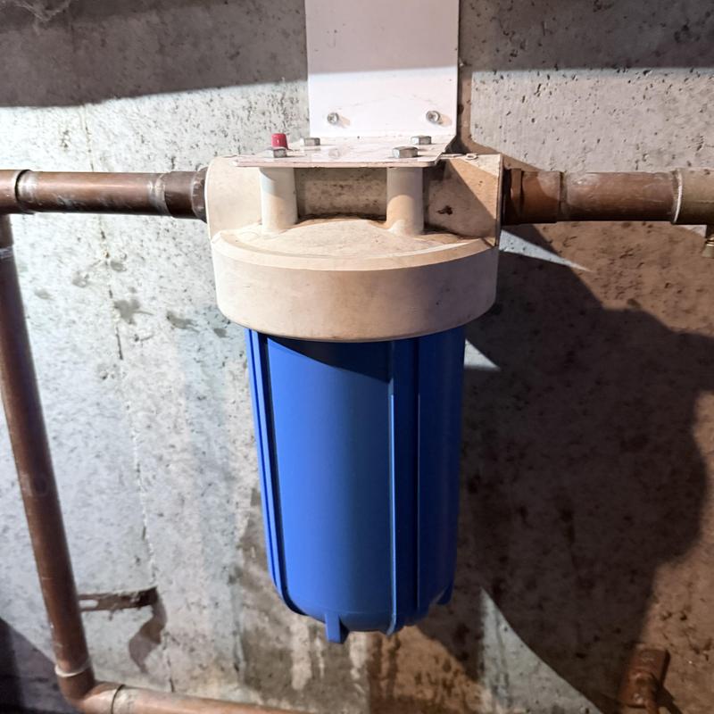 Water filter housing on copper plumbing system Water filter housing on copper plumbing system