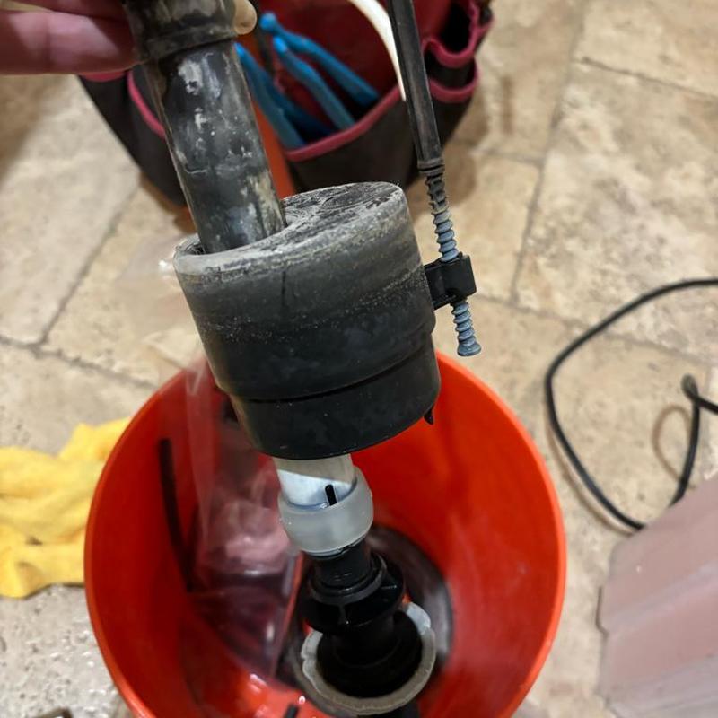 Toilet fill valve removed during repair in Queen Creek, AZ