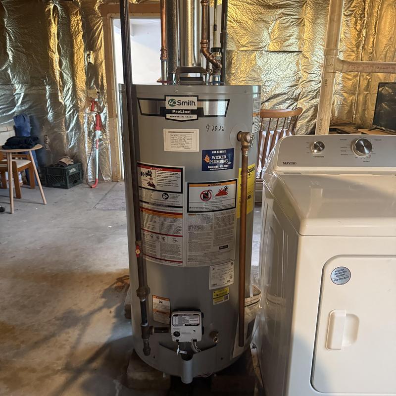 Water heater replacement in basement laundry area Water heater replacement in basement laundry area