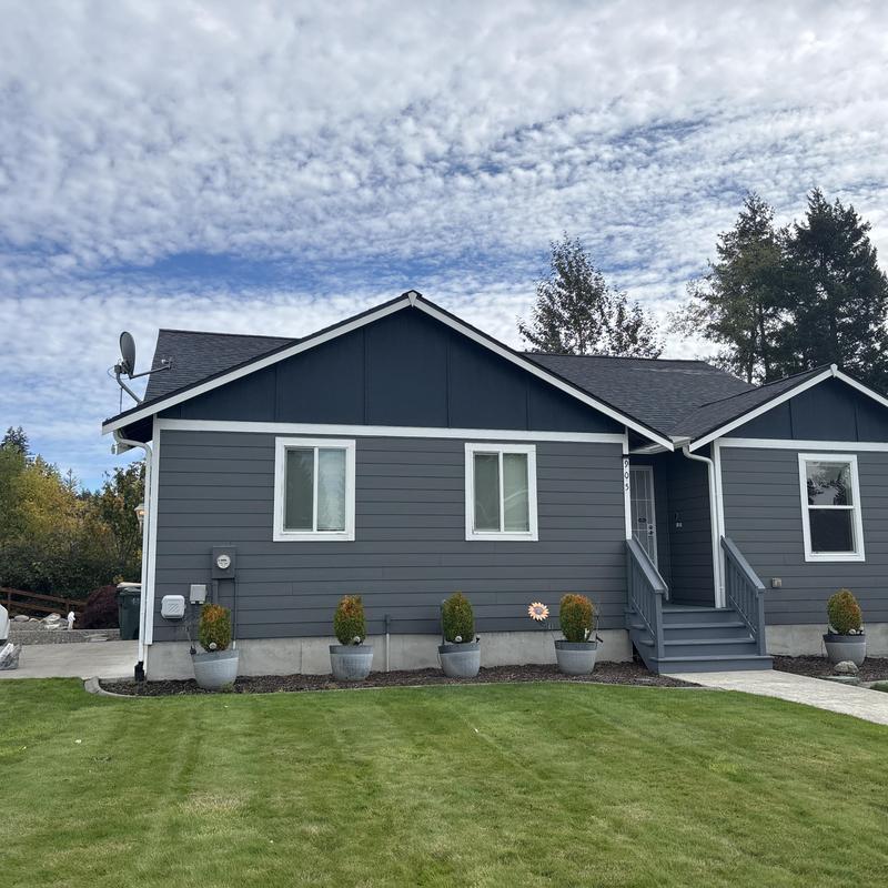 Asphalt shingle roof on residential house in Hayden, ID