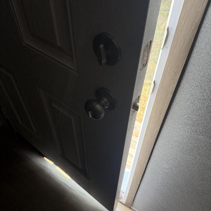 Mobile home door locks with new rekeying installed