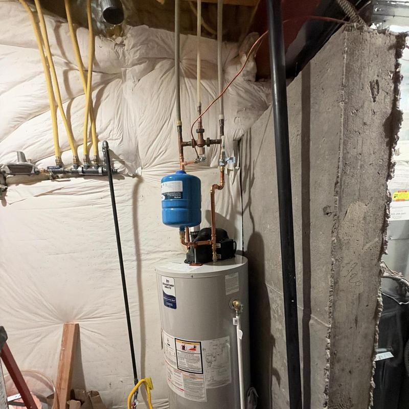 Water heater with new expansion tank and piping