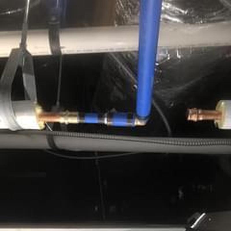 Filtered water line reroute with blue PEX piping