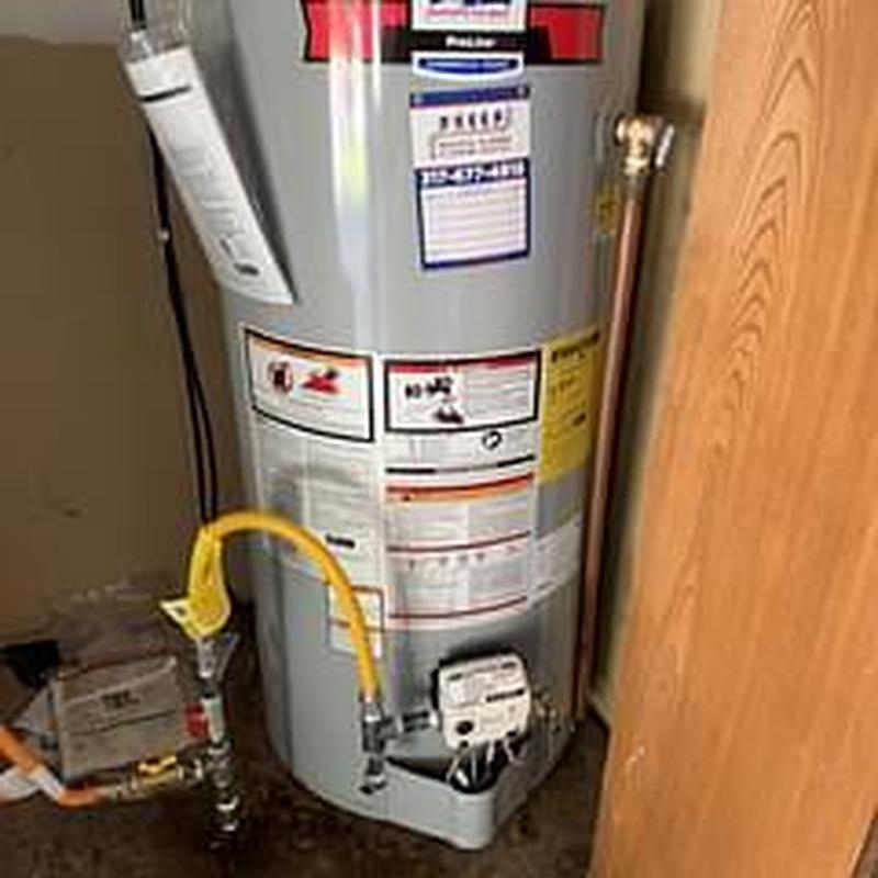 Gas water heater with yellow gas line connected