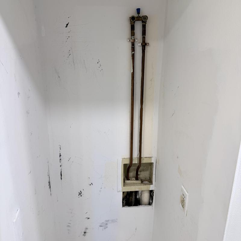 Laundry valve and copper supply pipes in wall niche Laundry valve and copper supply pipes in wall niche