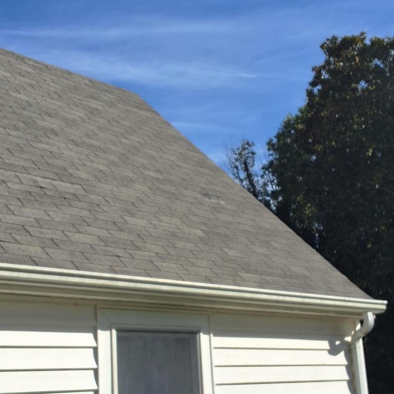 Asphalt shingle roof showing wear and needed replacement Asphalt shingle roof showing wear and needed replacement