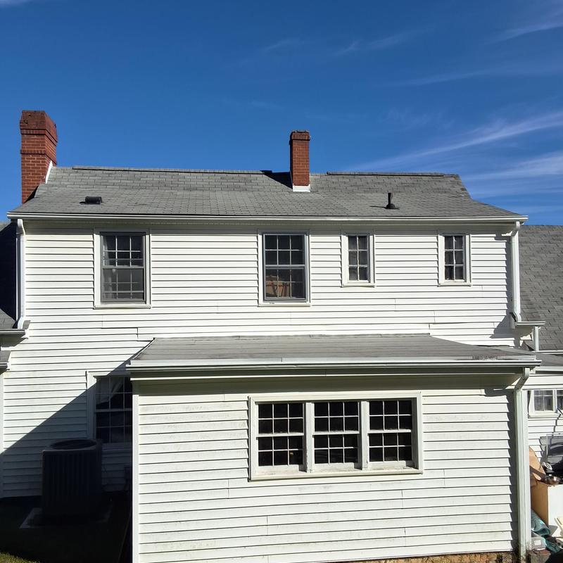 Asphalt shingle roof inspection on residential house Asphalt shingle roof inspection on residential house