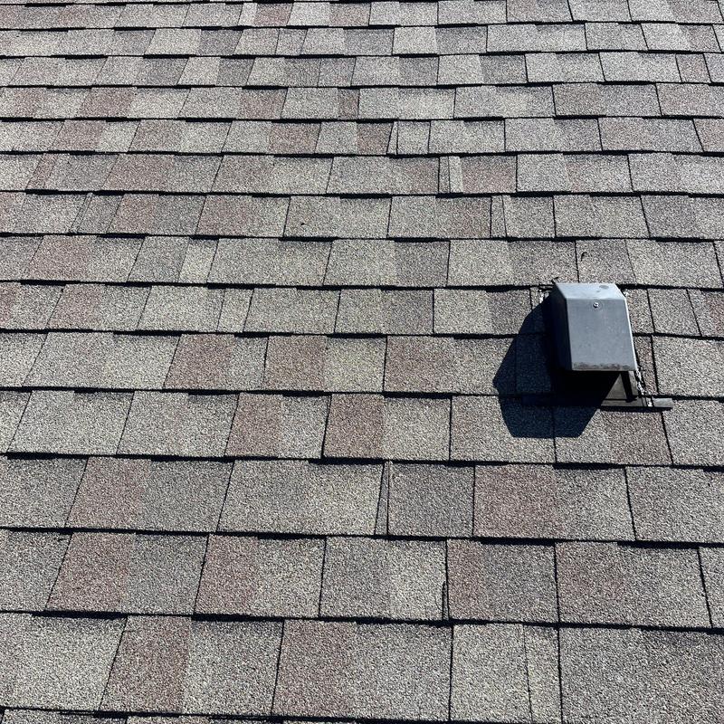Asphalt shingle roof with vent pipe flashing Asphalt shingle roof with vent pipe flashing