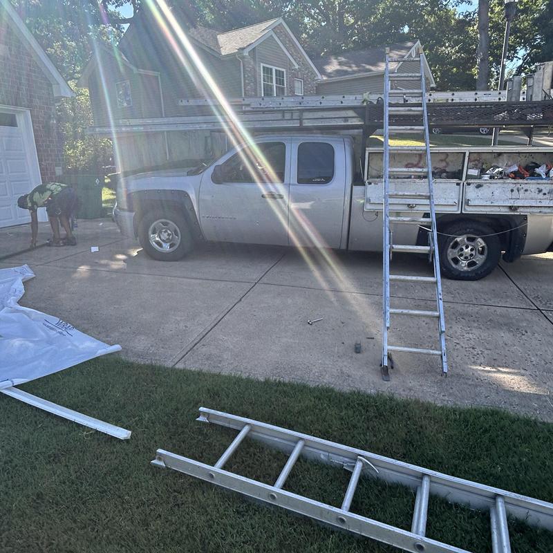 Siding and fascia repair tools with ladder and truck