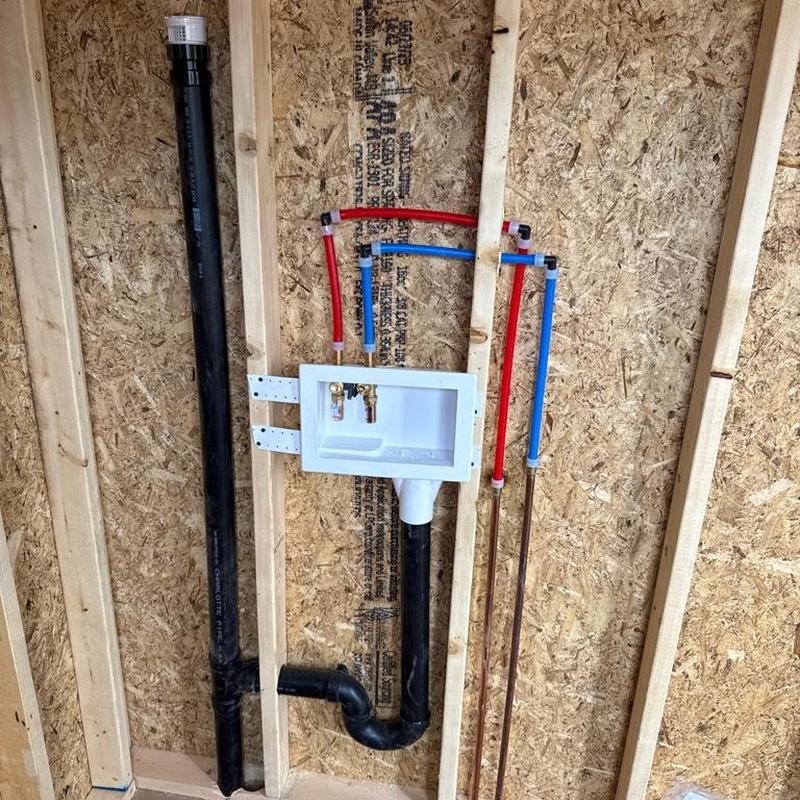 Laundry room water and drain lines installation in framing