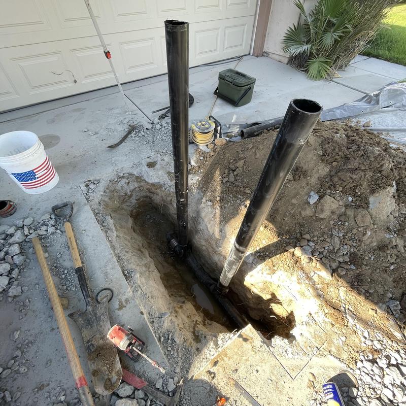 3-inch ABS sewer piping replacement trench and tools