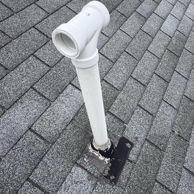 Gas vent pipe missing metal boot and storm collar on roof Gas vent pipe missing metal boot and storm collar on roof