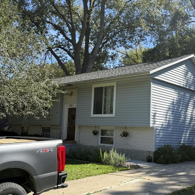 Atlas Pinnacle Pristine asphalt roof and gutters