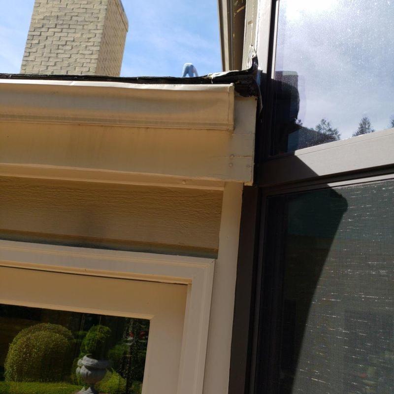 Roof transition point with possible water intrusion risks