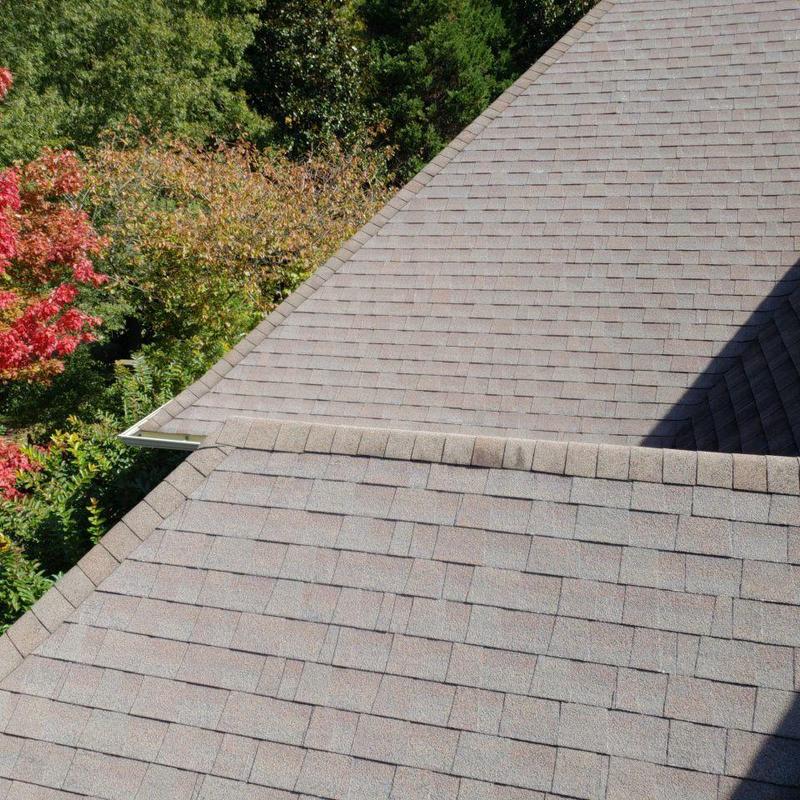 Asphalt shingle roof with transition point inspection