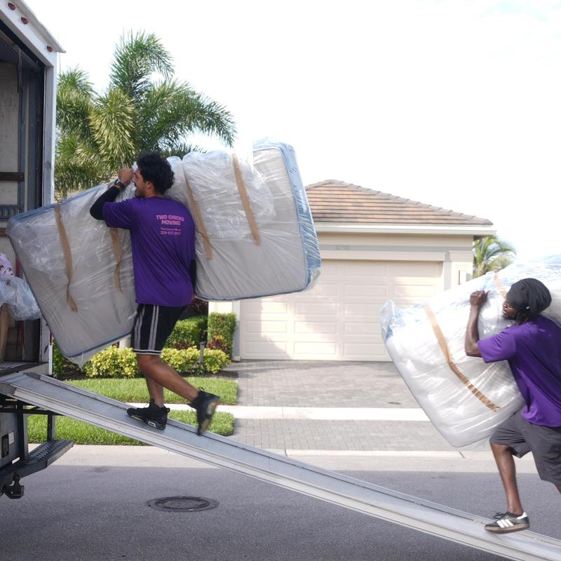 Mattresses wrapped for moving into storage unit