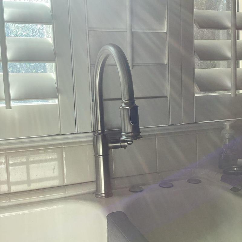Kitchen faucet stainless steel installation near window
