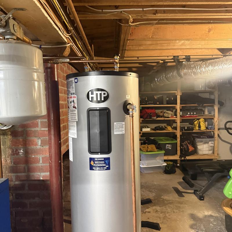 Water heater installation in basement with copper piping