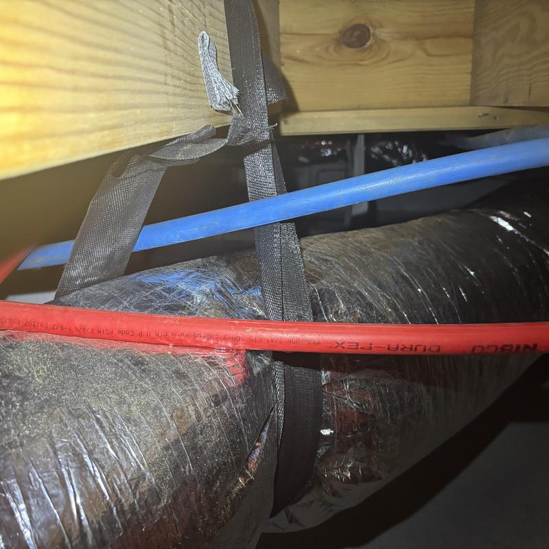 Insulated ducting with secured wiring in crawl space Insulated ducting with secured wiring in crawl space