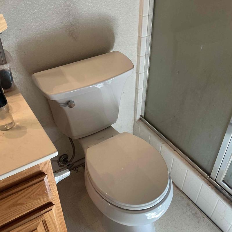 Toilet installation in Casita bathroom corner