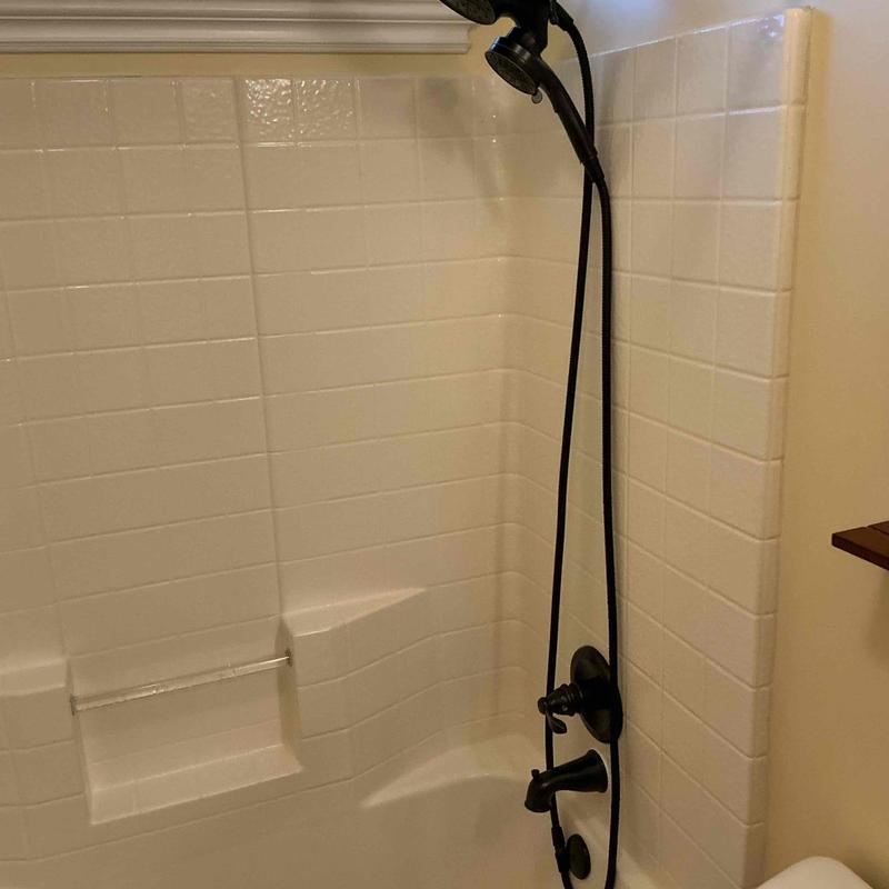 Showerhead and tub faucet with black fixtures installed
