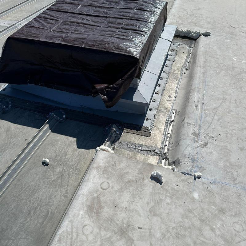 Commercial roof flashing and sealing inspection detail Commercial roof flashing and sealing inspection detail