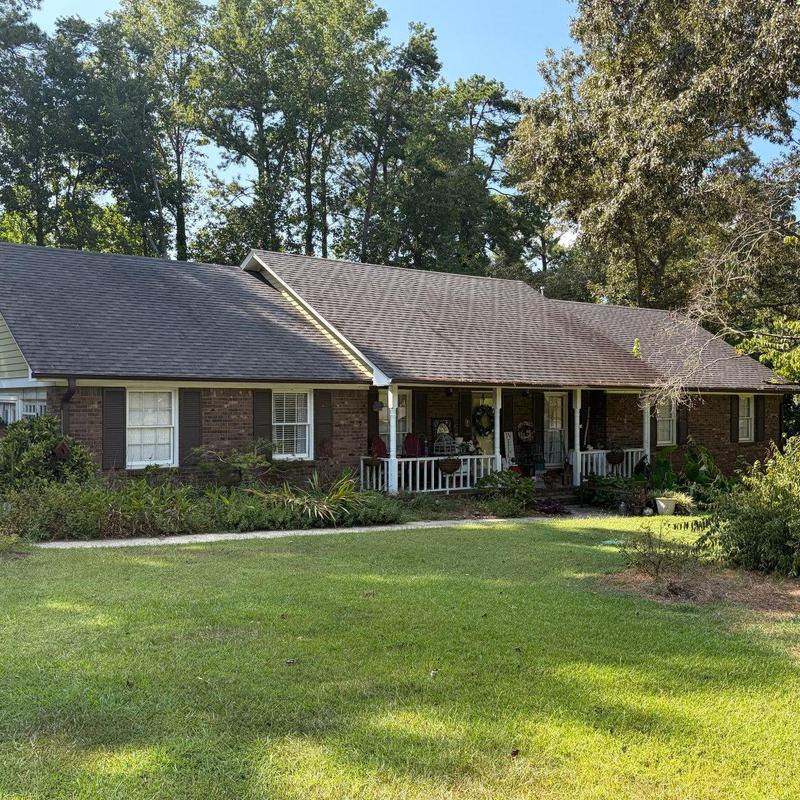Asphalt shingle roof with porch and gutters in Douglasville Asphalt shingle roof with porch and gutters in Douglasville