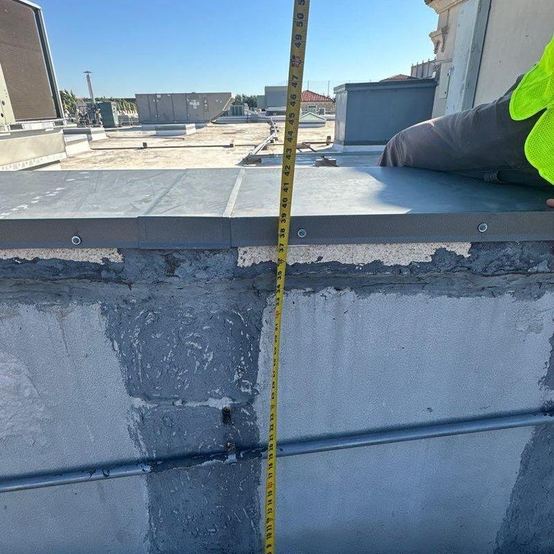 Roof cap flashing height measurement at commercial roof edge Roof cap flashing height measurement at commercial roof edge