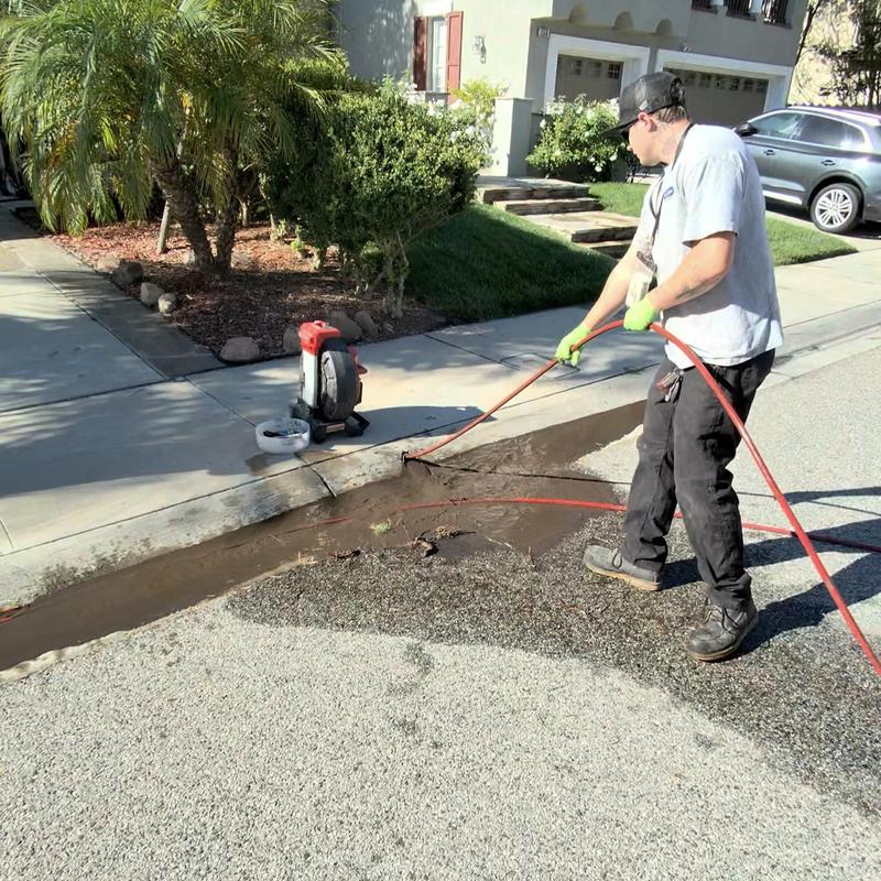 Storm drain hydro jetting and cleaning in driveway Storm drain hydro jetting and cleaning in driveway