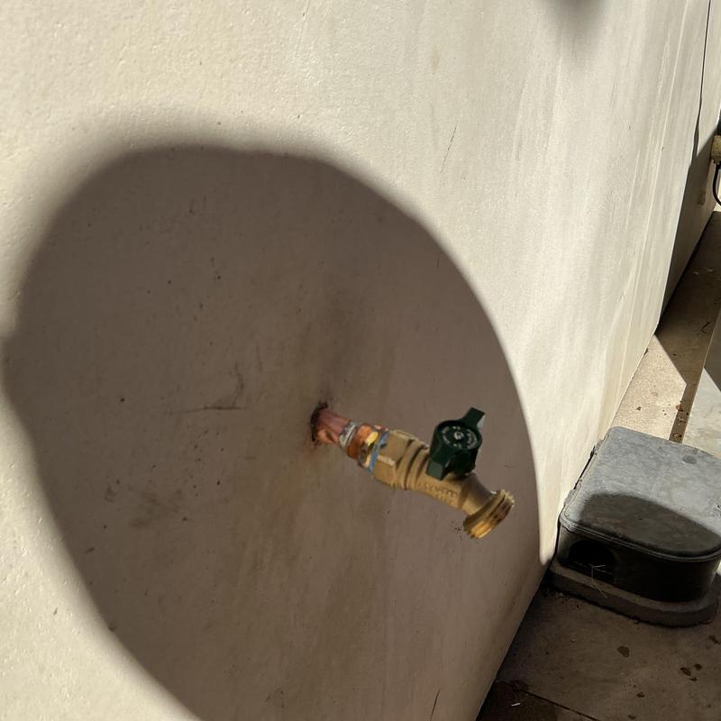 Copper outdoor hose bib with new valve installed