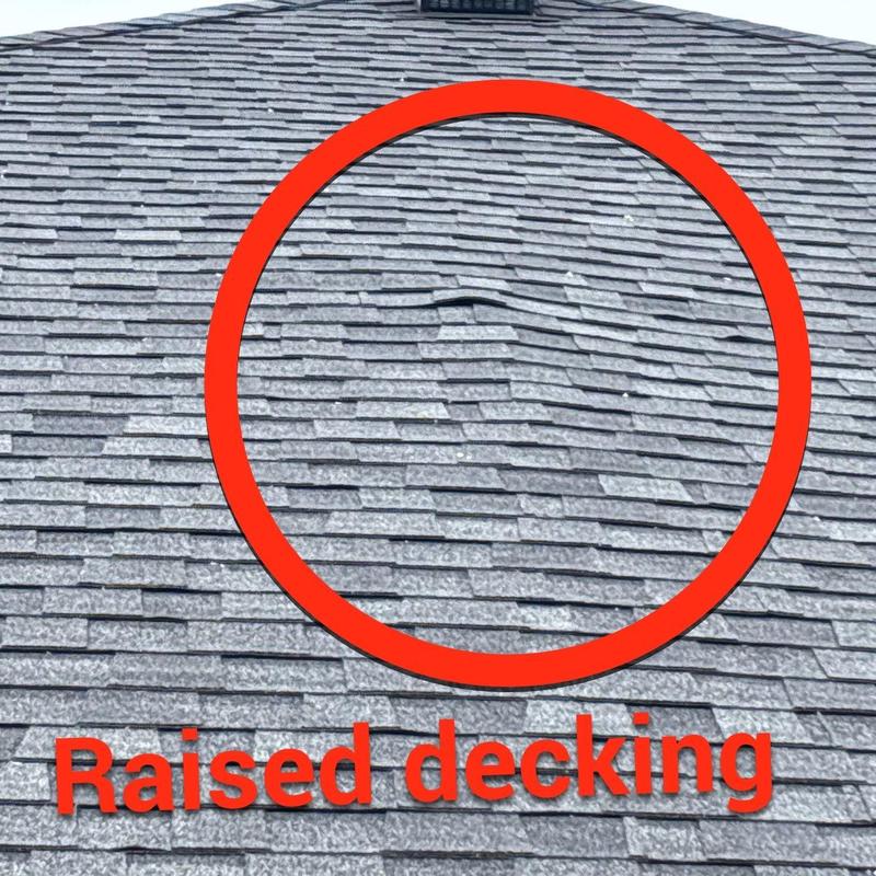 Asphalt shingles with raised decking and damage signs