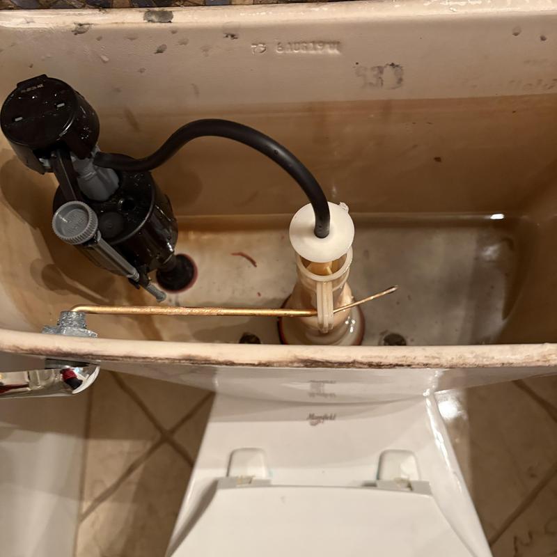 Toilet fill valve and flush seal replacement inside tank