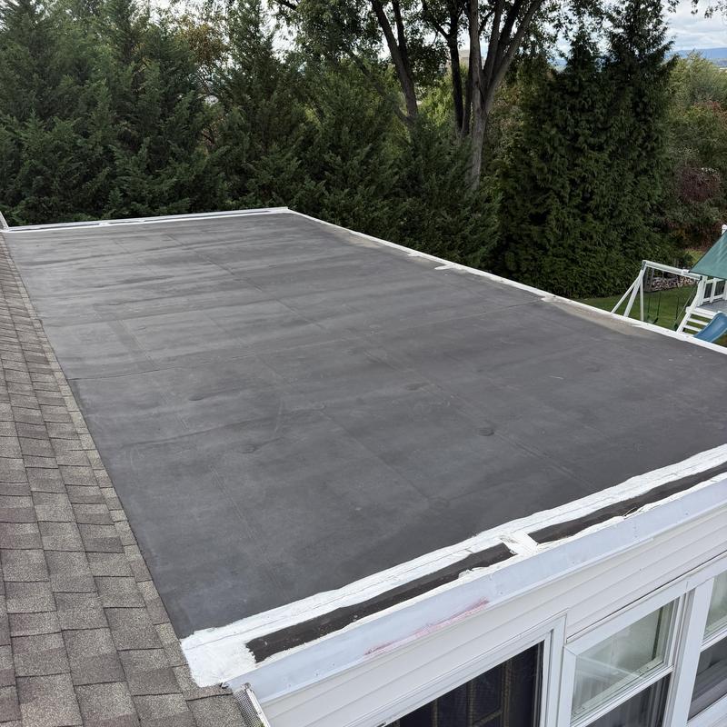 EPDM rubber roof with sealed edges on flat surface EPDM rubber roof with sealed edges on flat surface
