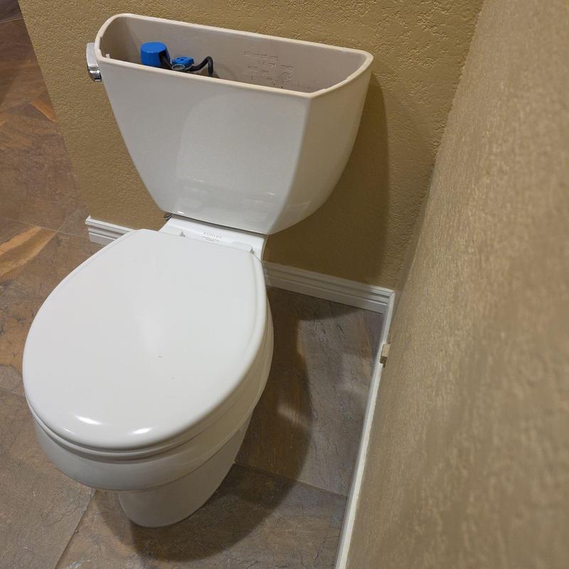 Toilet tank interior components with closed seat and lid