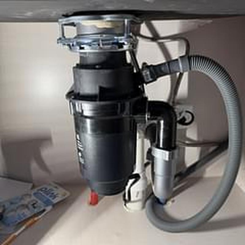 Garbage disposer under-sink plumbing and connections