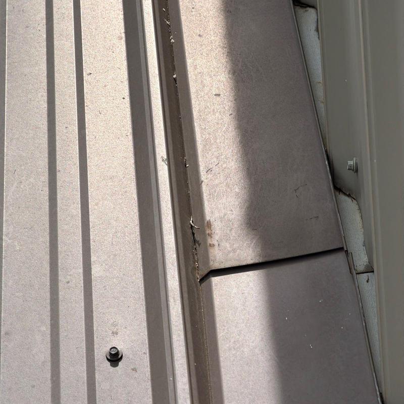 Metal roofing panels with seam and fastener detail