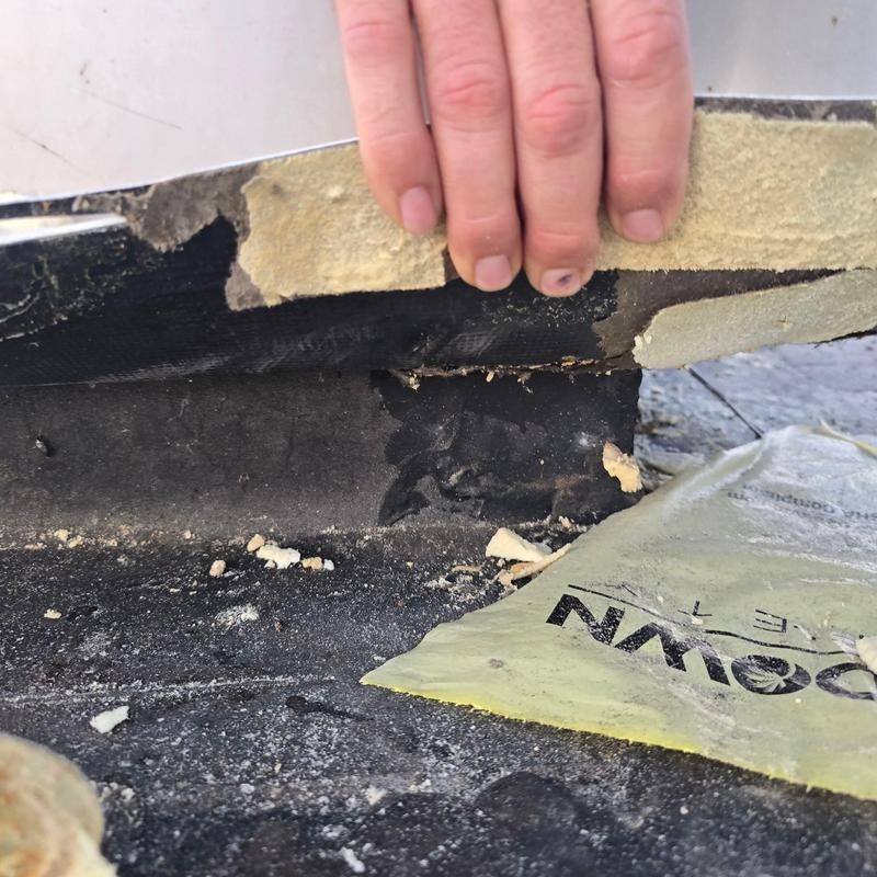 Low-slope roofing membrane layer with damaged insulation Low-slope roofing membrane layer with damaged insulation