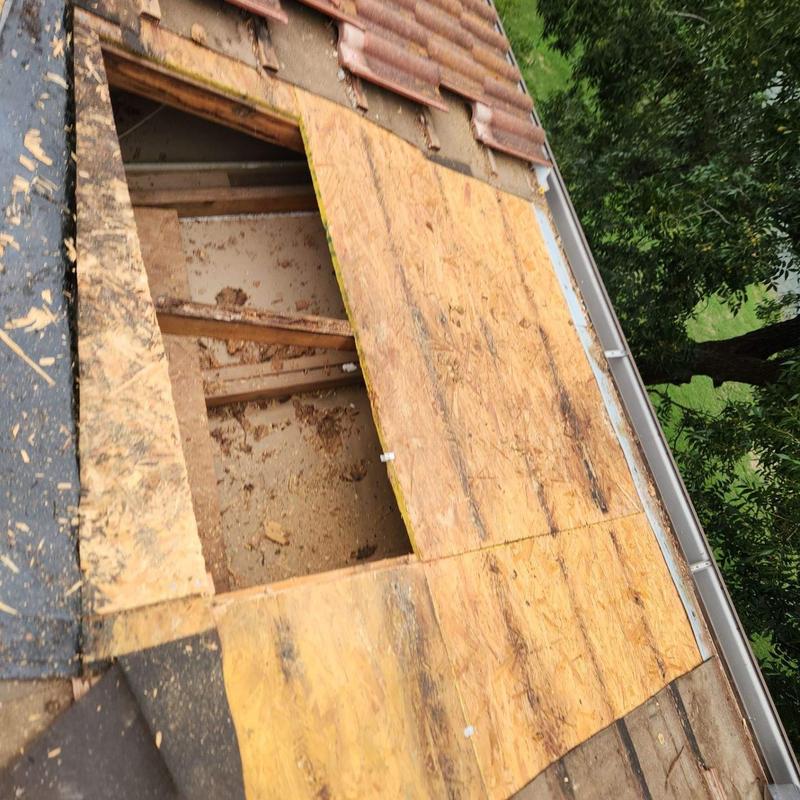 Roof decking replacement with plywood panels installed Roof decking replacement with plywood panels installed