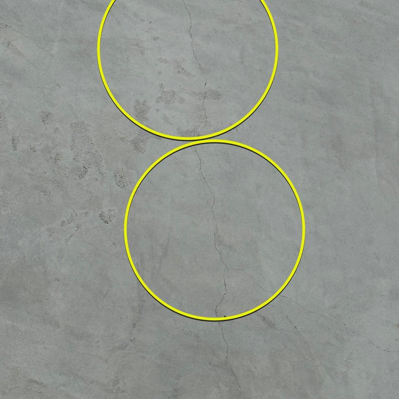 Concrete wall crack and leak with yellow highlight circles Concrete wall crack and leak with yellow highlight circles