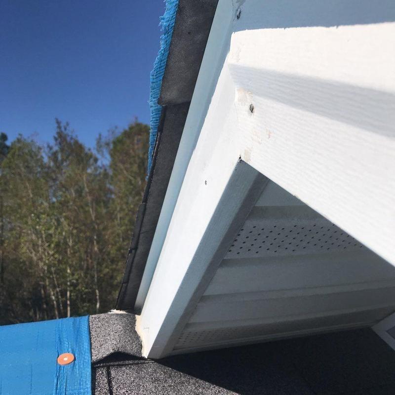 Roof shingle edge with foam and protective tarp installation