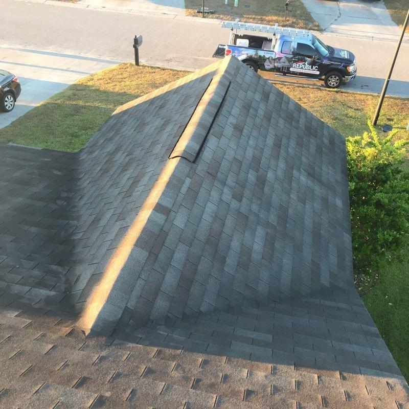 Asphalt shingle roof with ridge cap installation