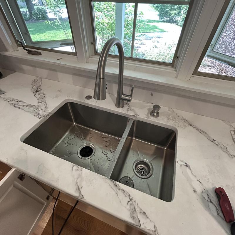 Kitchen faucet with soap dispenser and dual sink installation Kitchen faucet with soap dispenser and dual sink installation