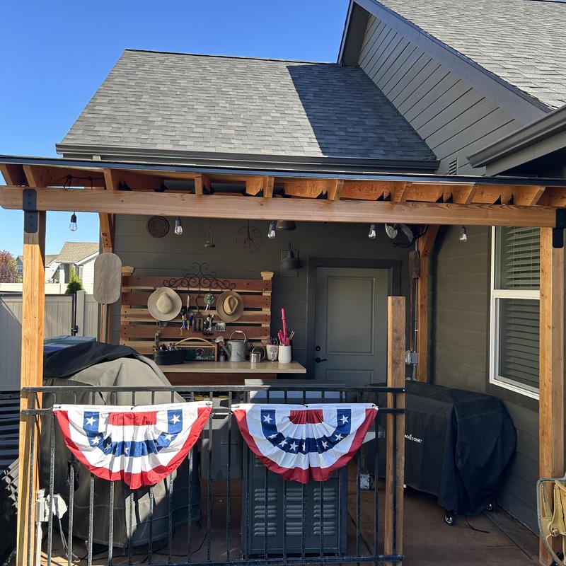 Back patio gutter installed with downspout rerouted