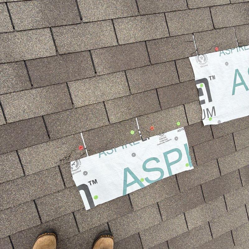 Asphalt shingles with hail damage inspection markers