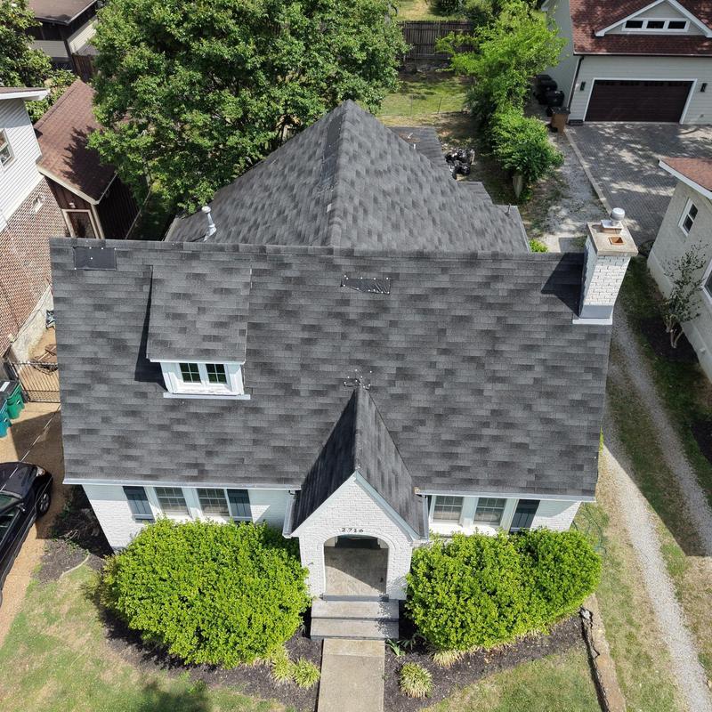 Asphalt shingle roof with dormer and chimney inspection